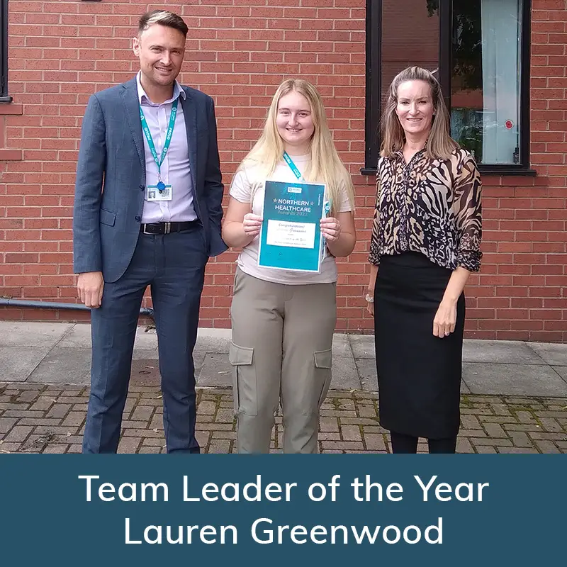 Lauren Greenwood receiving her award