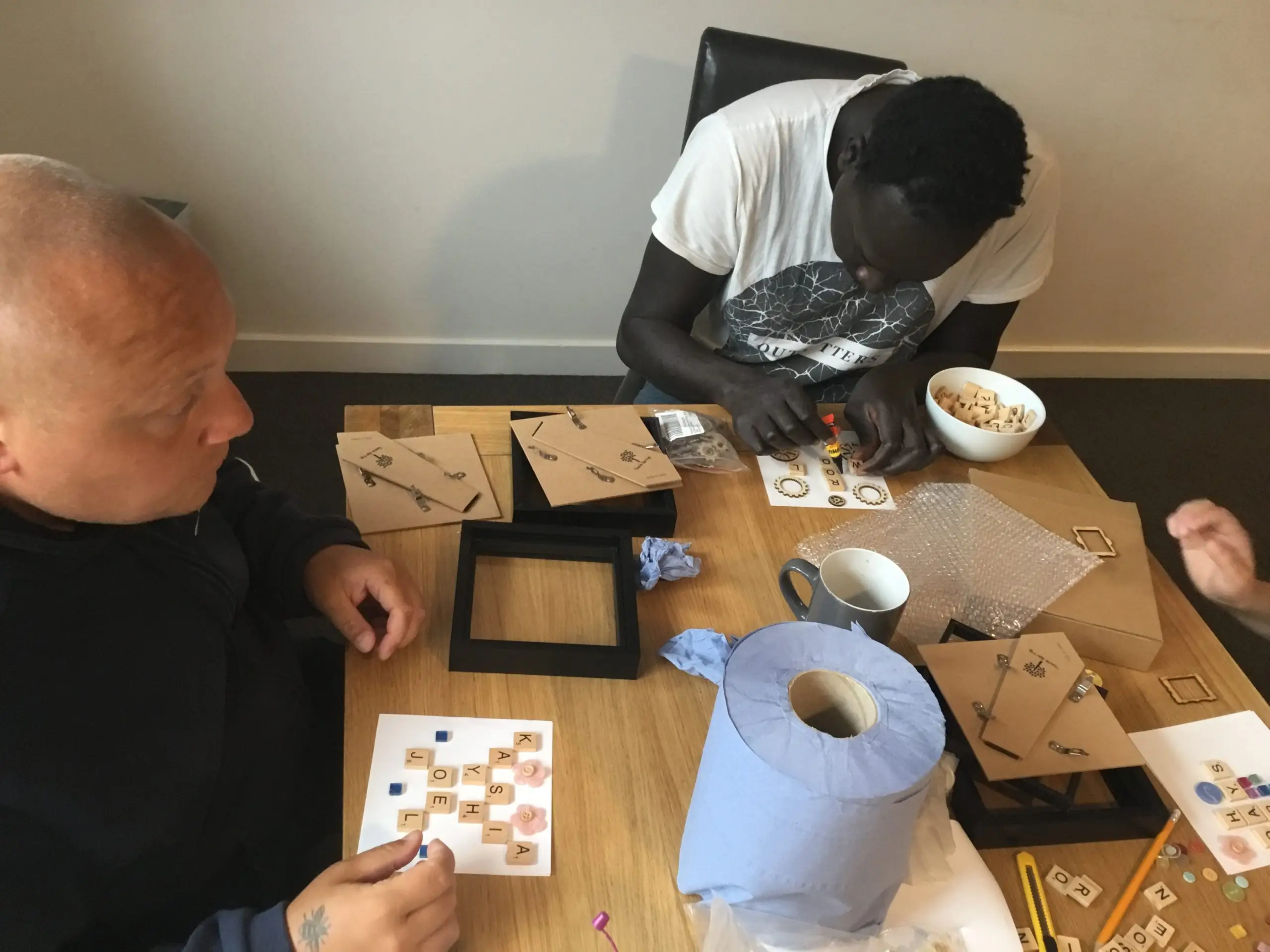 residents making handmade personalised frames