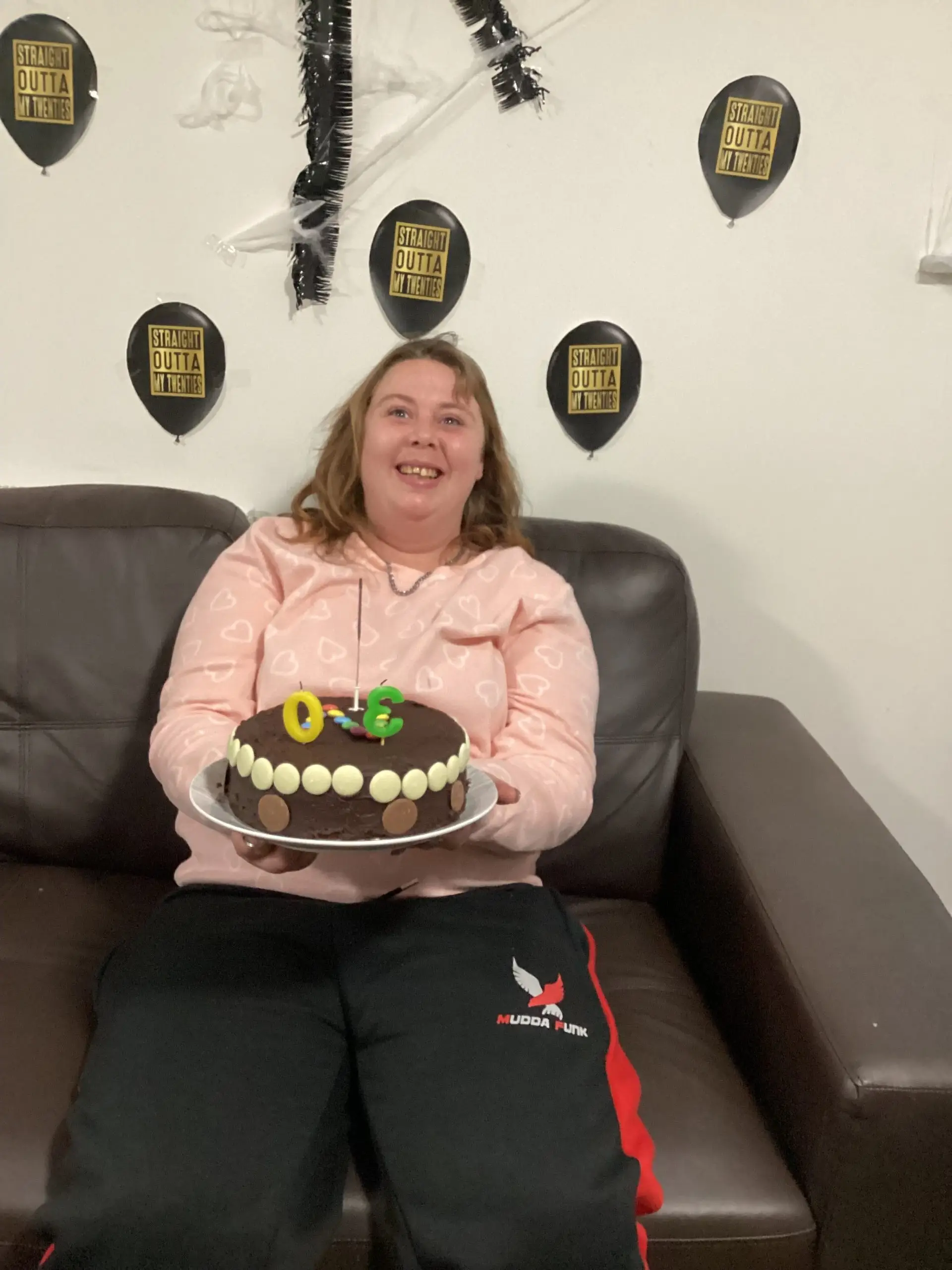 resident with birthday cake