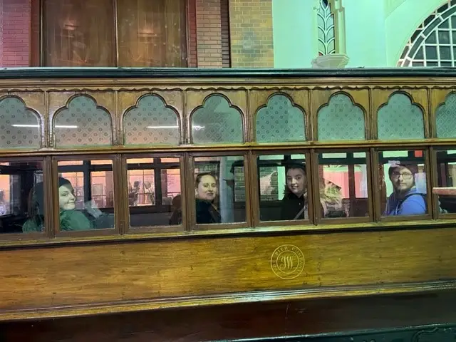 Residents looking through a window