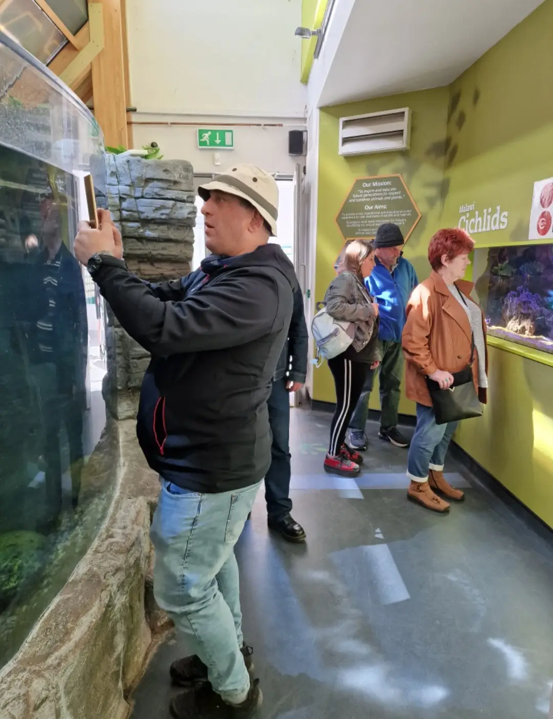 residents looking at museum display