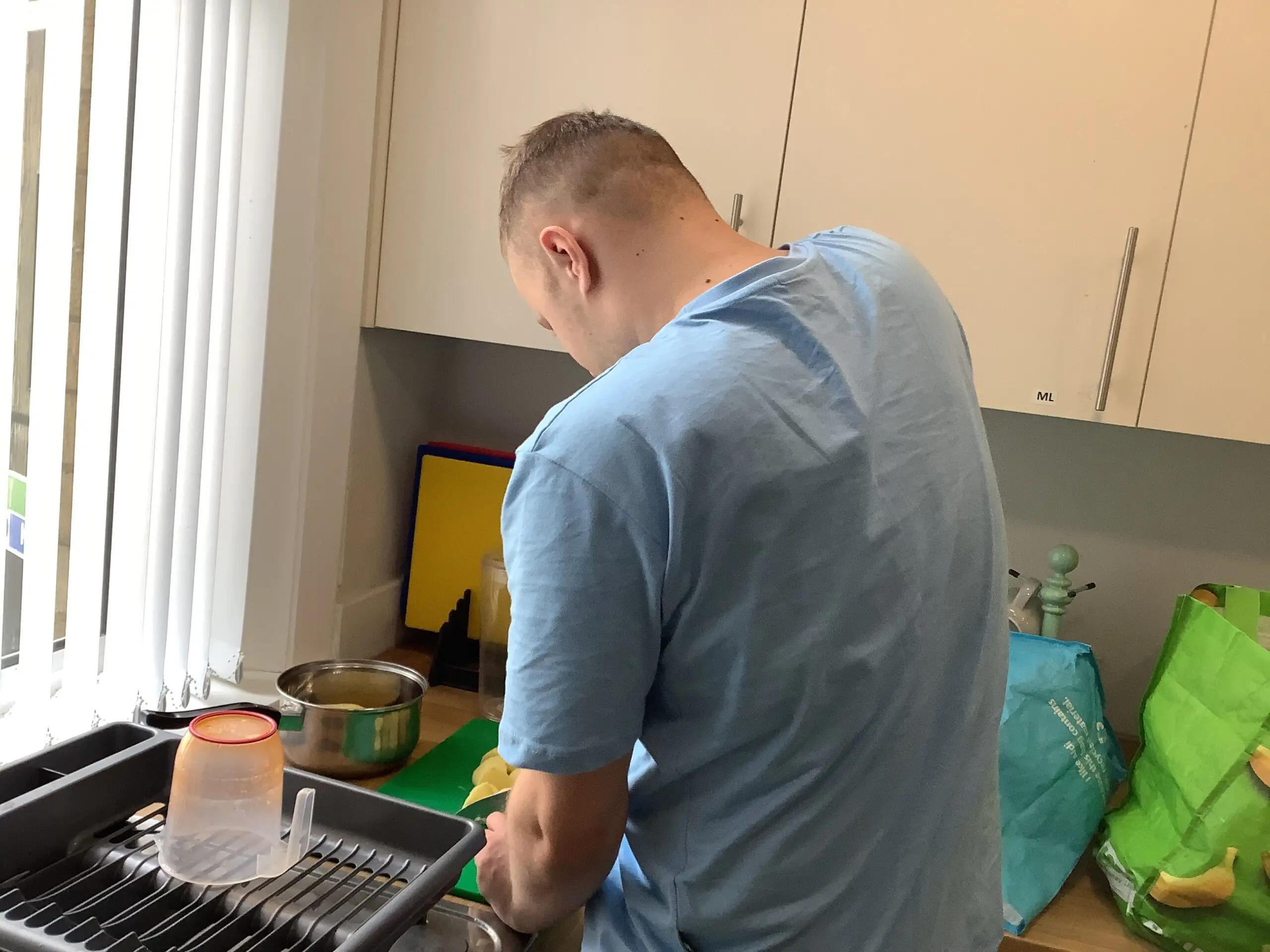 male resident cooking