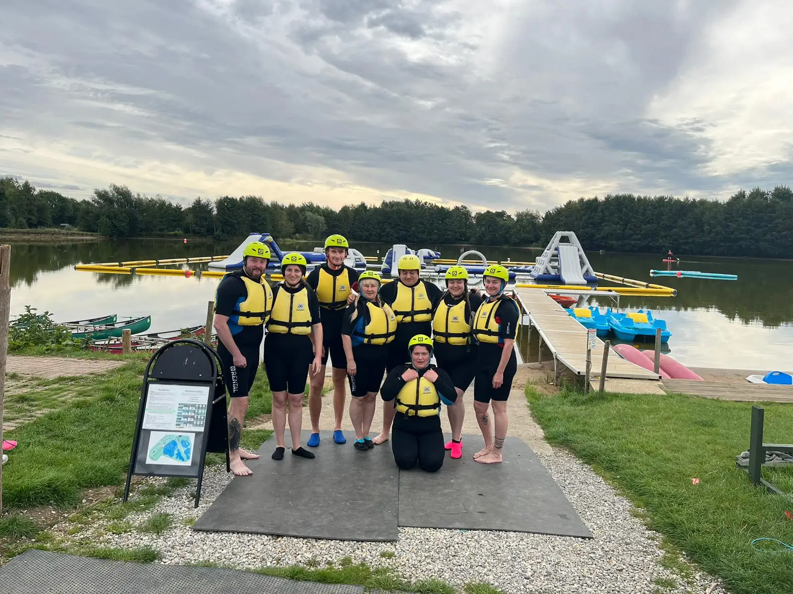 Amy Johnson team members group pic in yellow buoyancy aids
