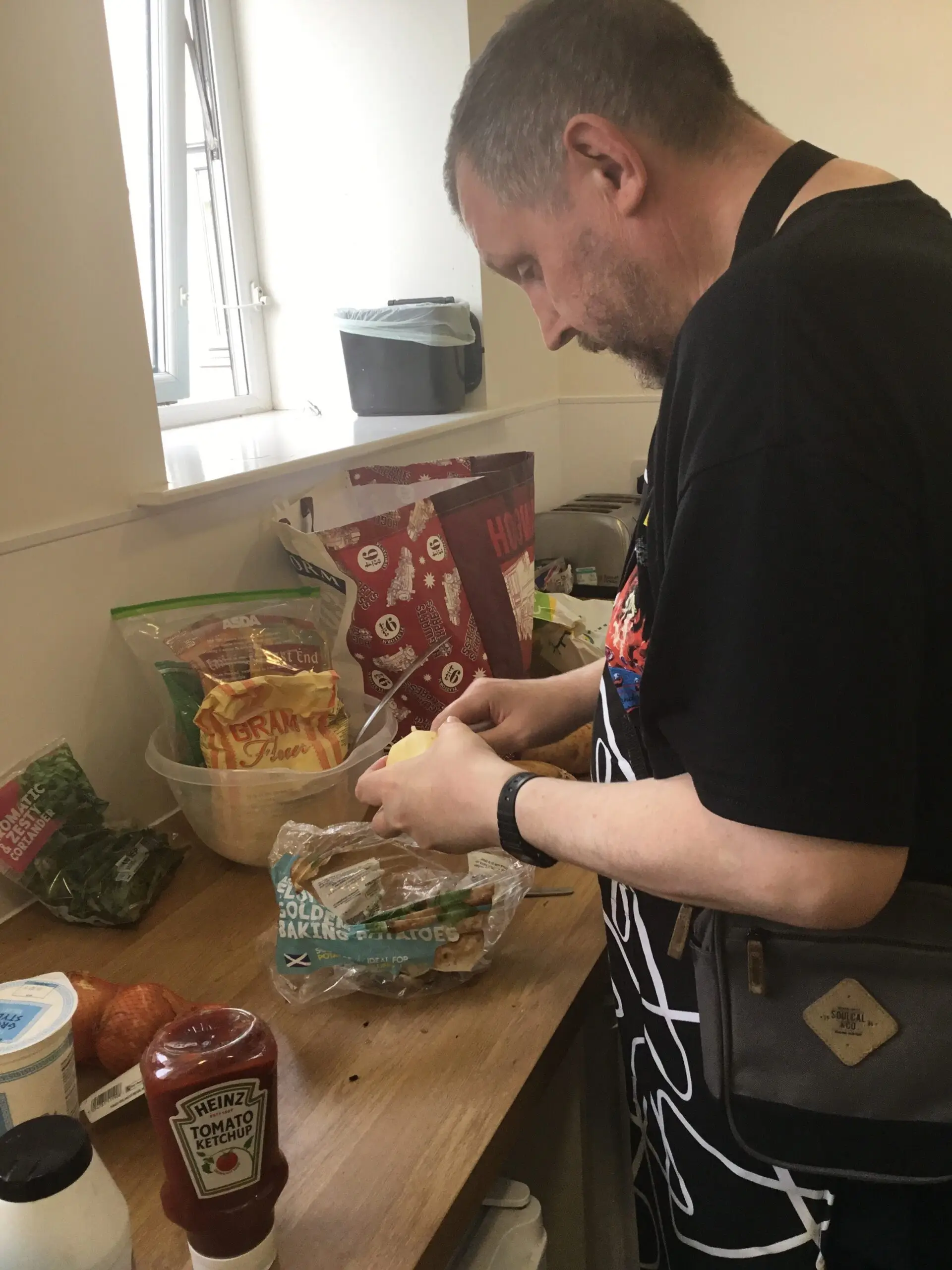 resident peeling potatoes