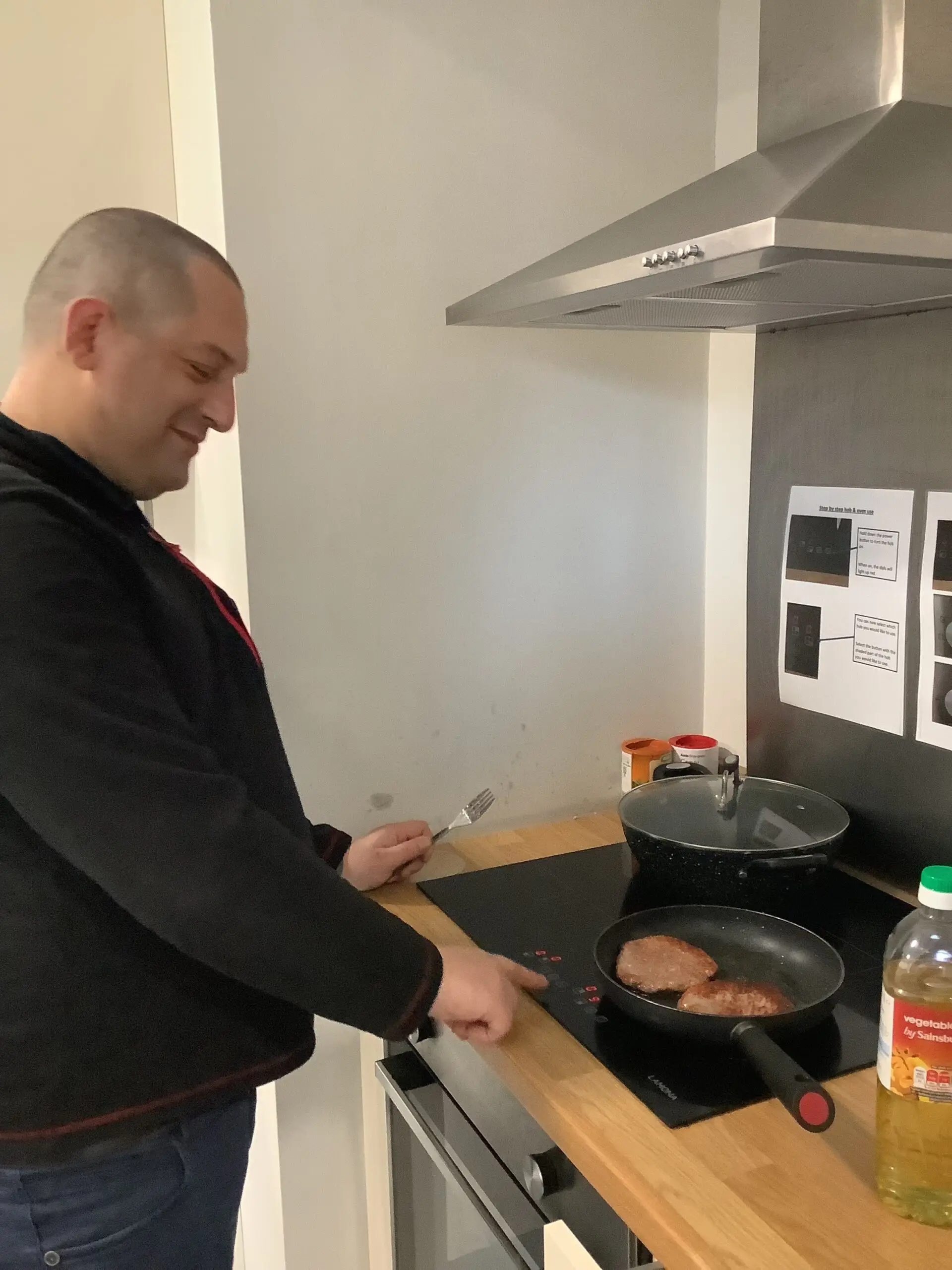 resident frying burgers