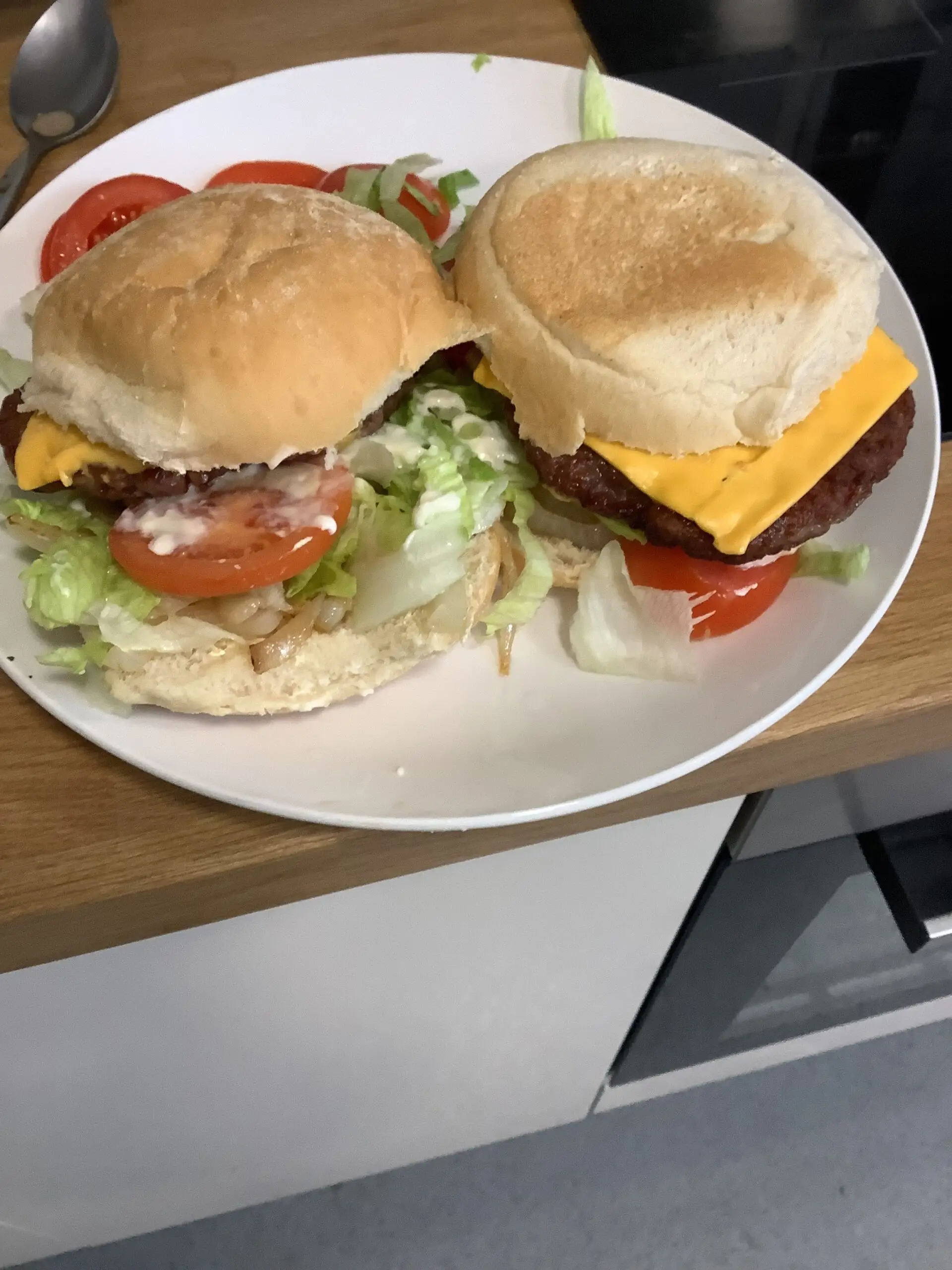 2 homemade burgers on a plate