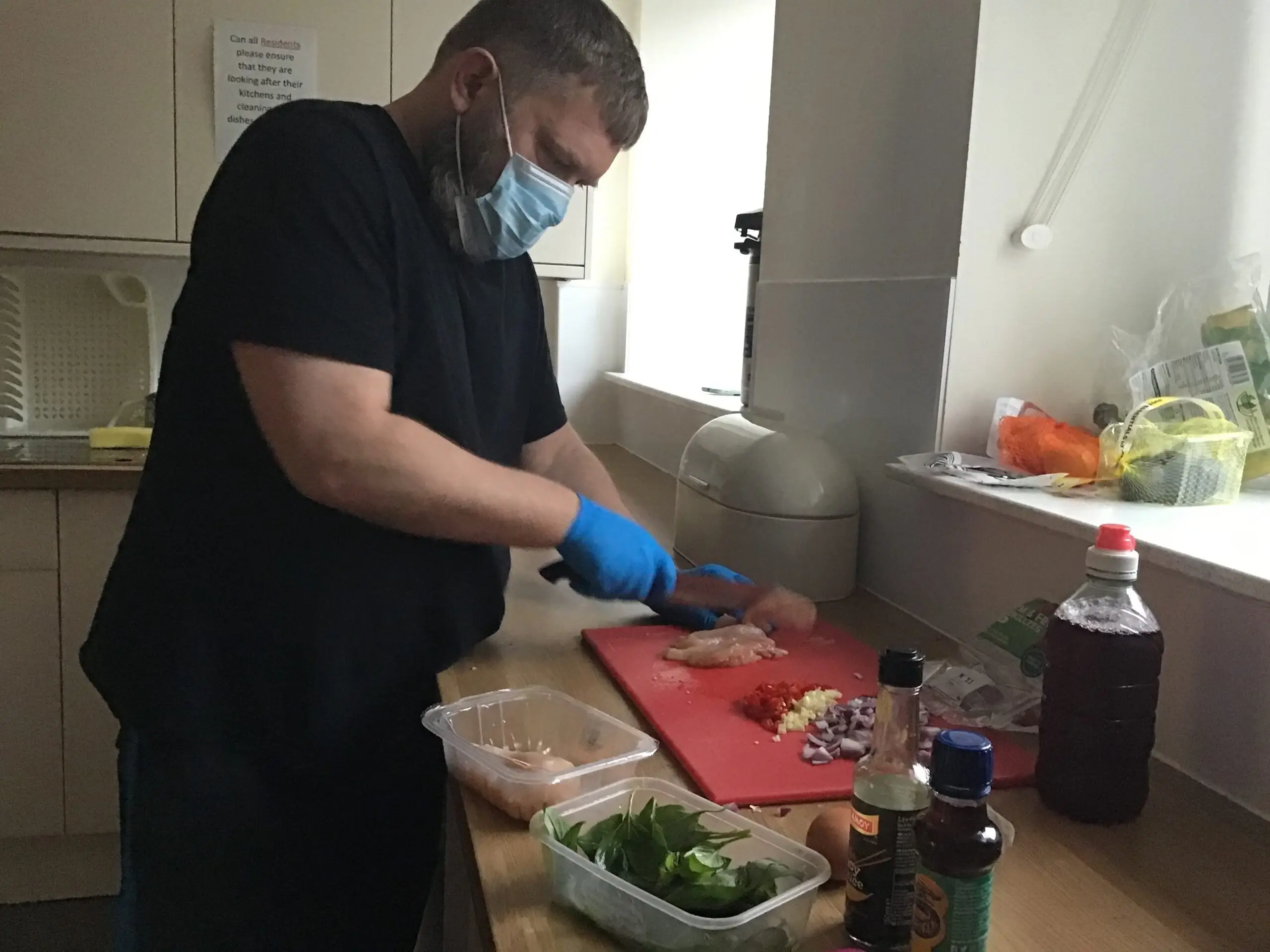 resident cooking chicken