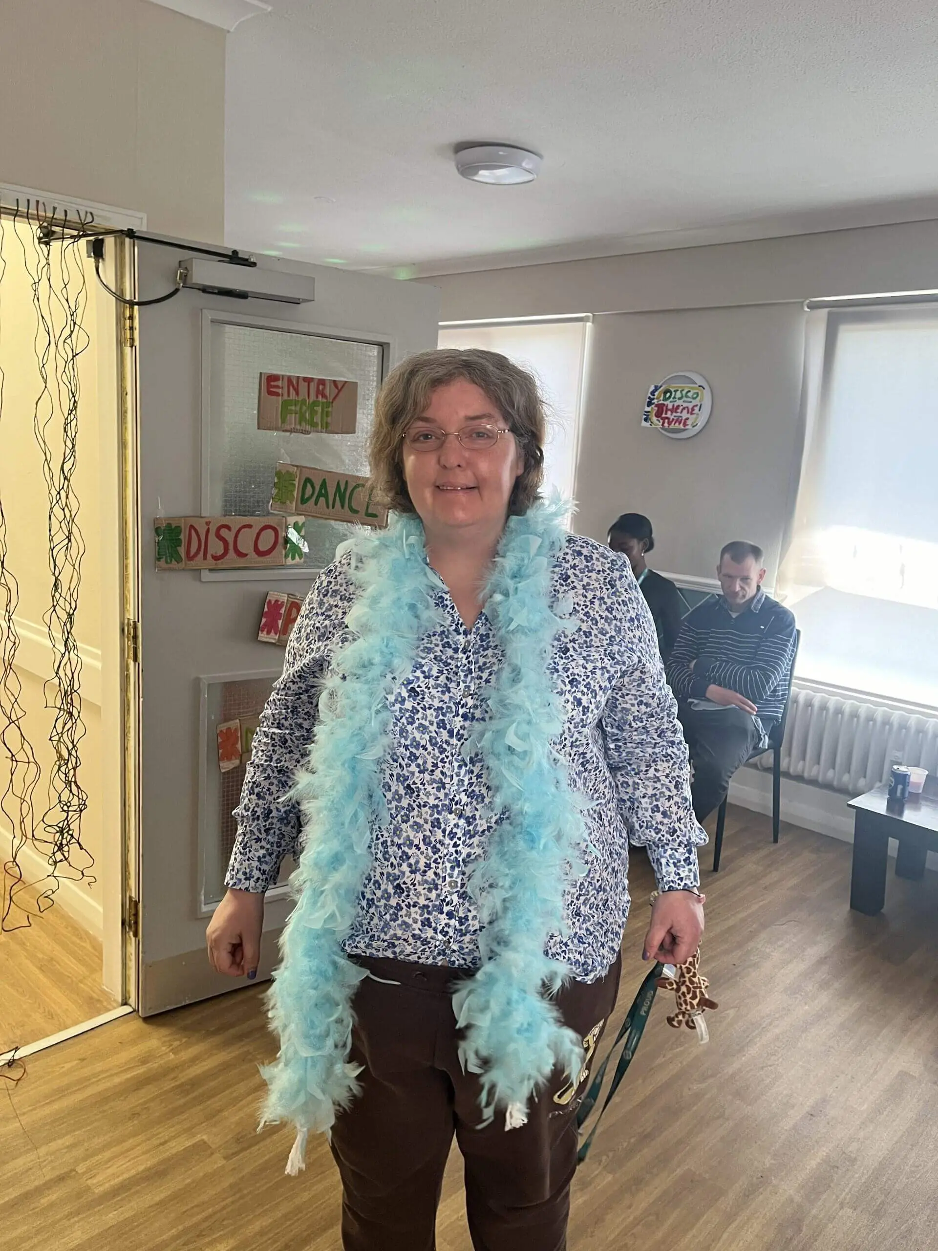 Lady wearing feather boer