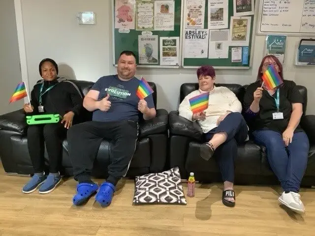 Group of people with pride flags
