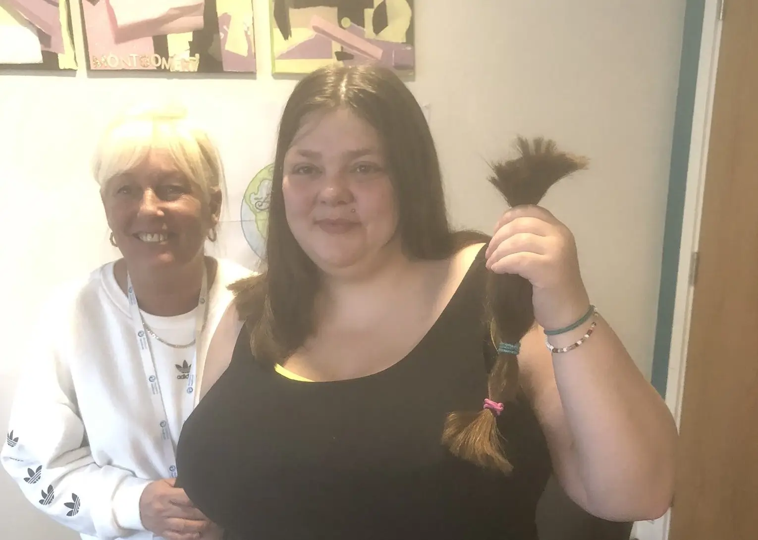 resident holding hair