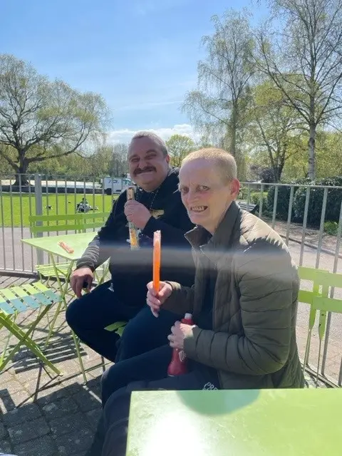 2 residents enjoying ice pops