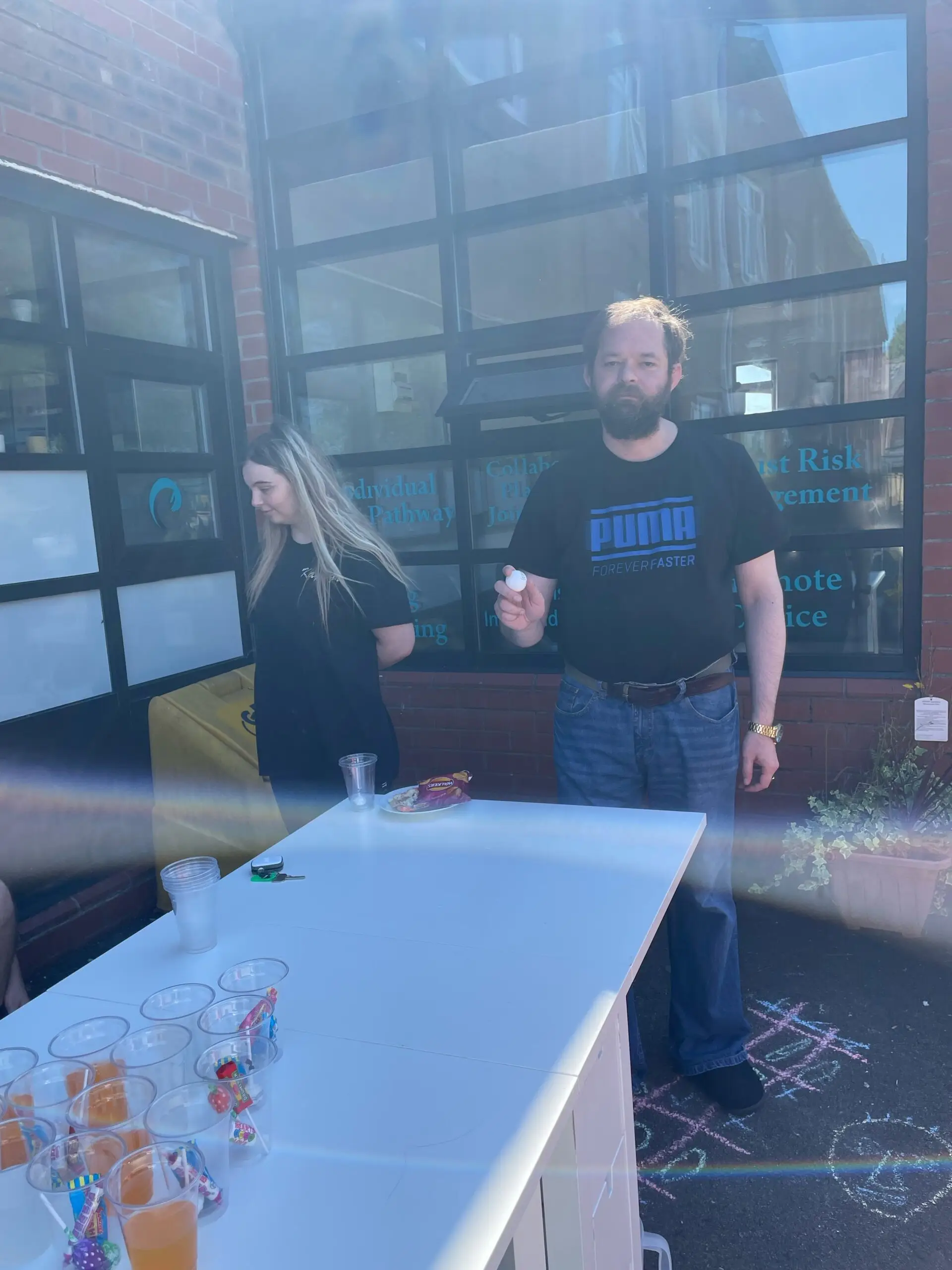 residents playing juice pong