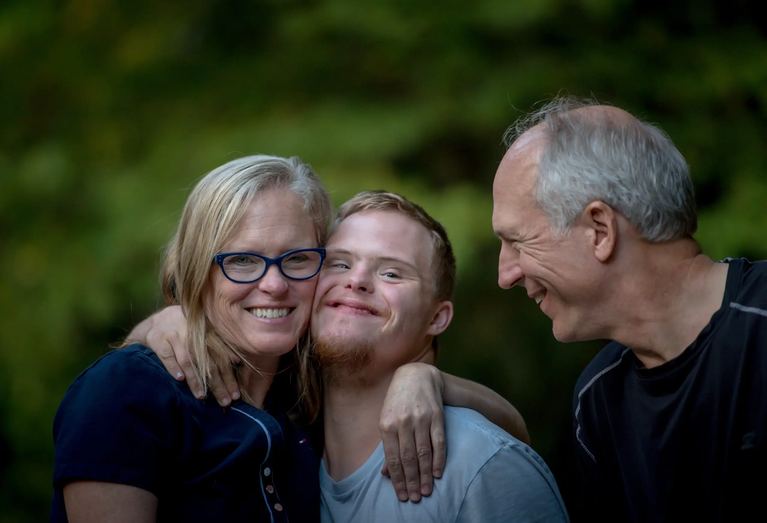 3 people hugging