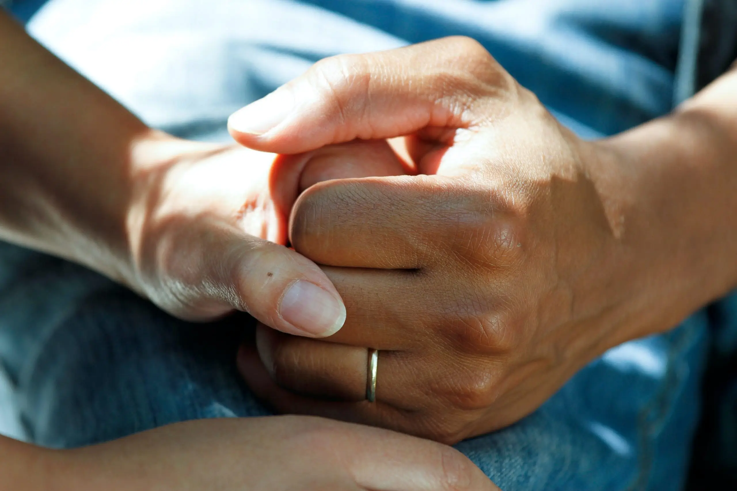 close up of two hands holding