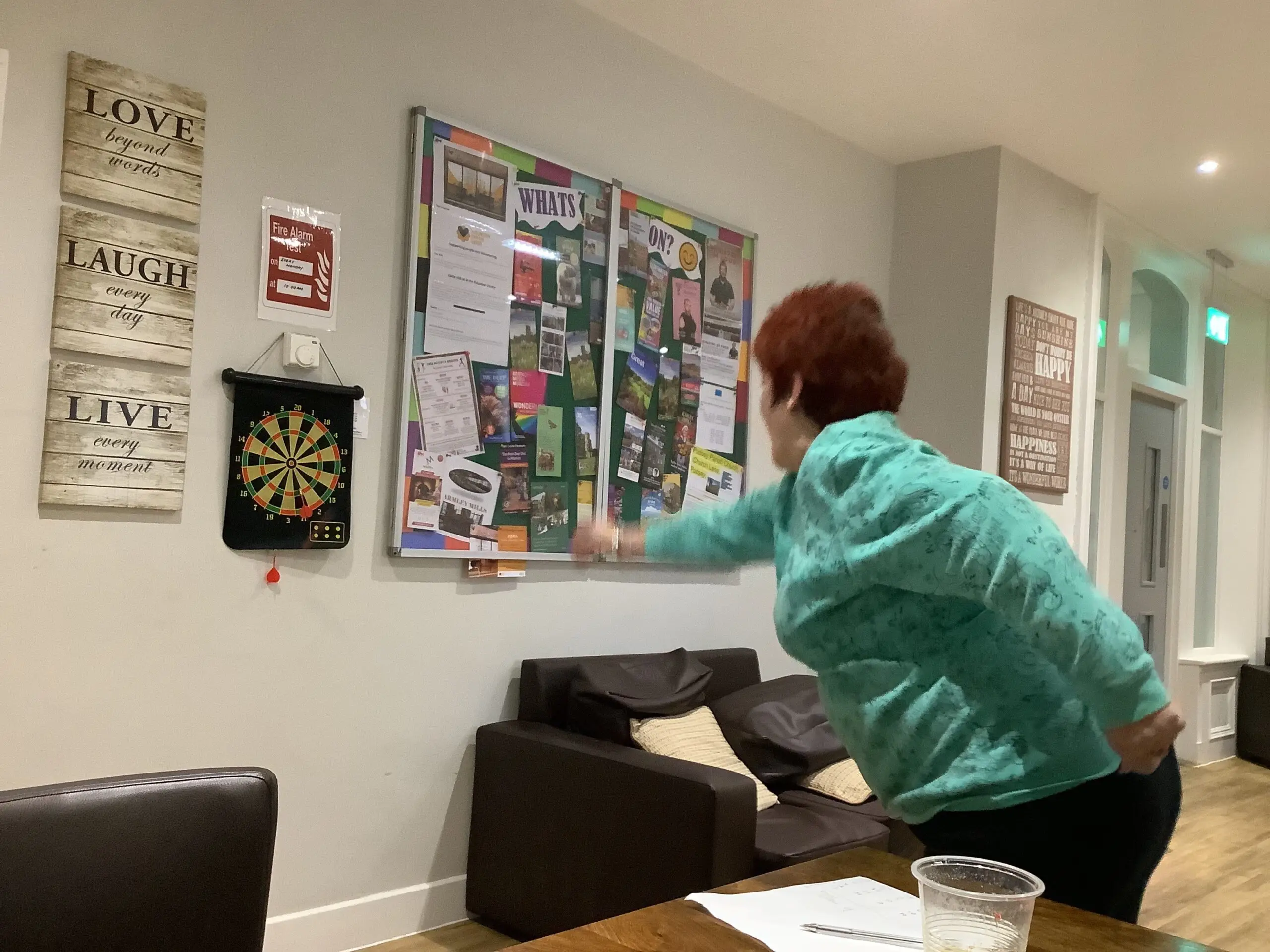 resident playing darts