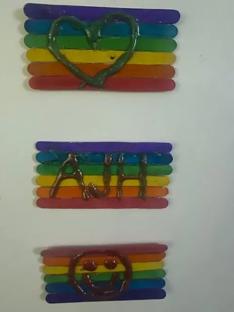 rainbow flags made from lollipop sticks