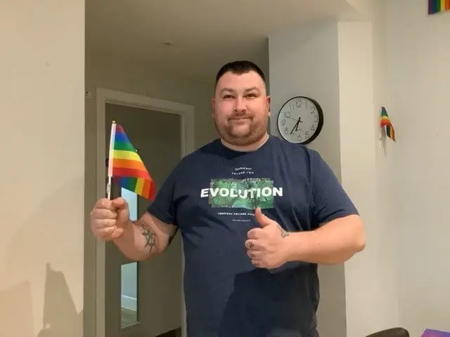 Gentleman with Pride flag