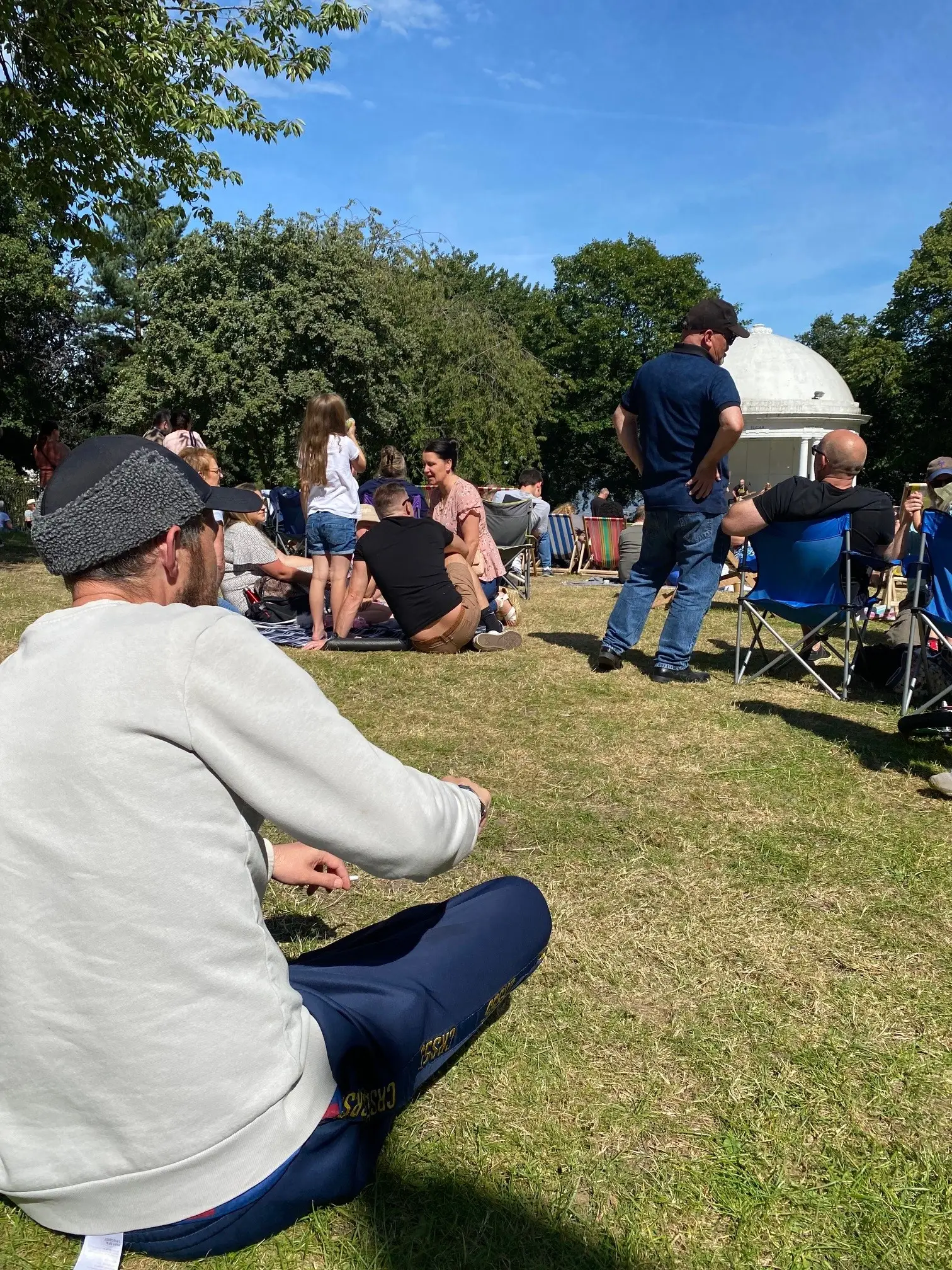 resident sitting on field