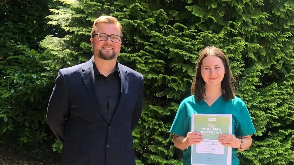 Rising Star award winner Team Leader Georgina Flavell being presented with her award