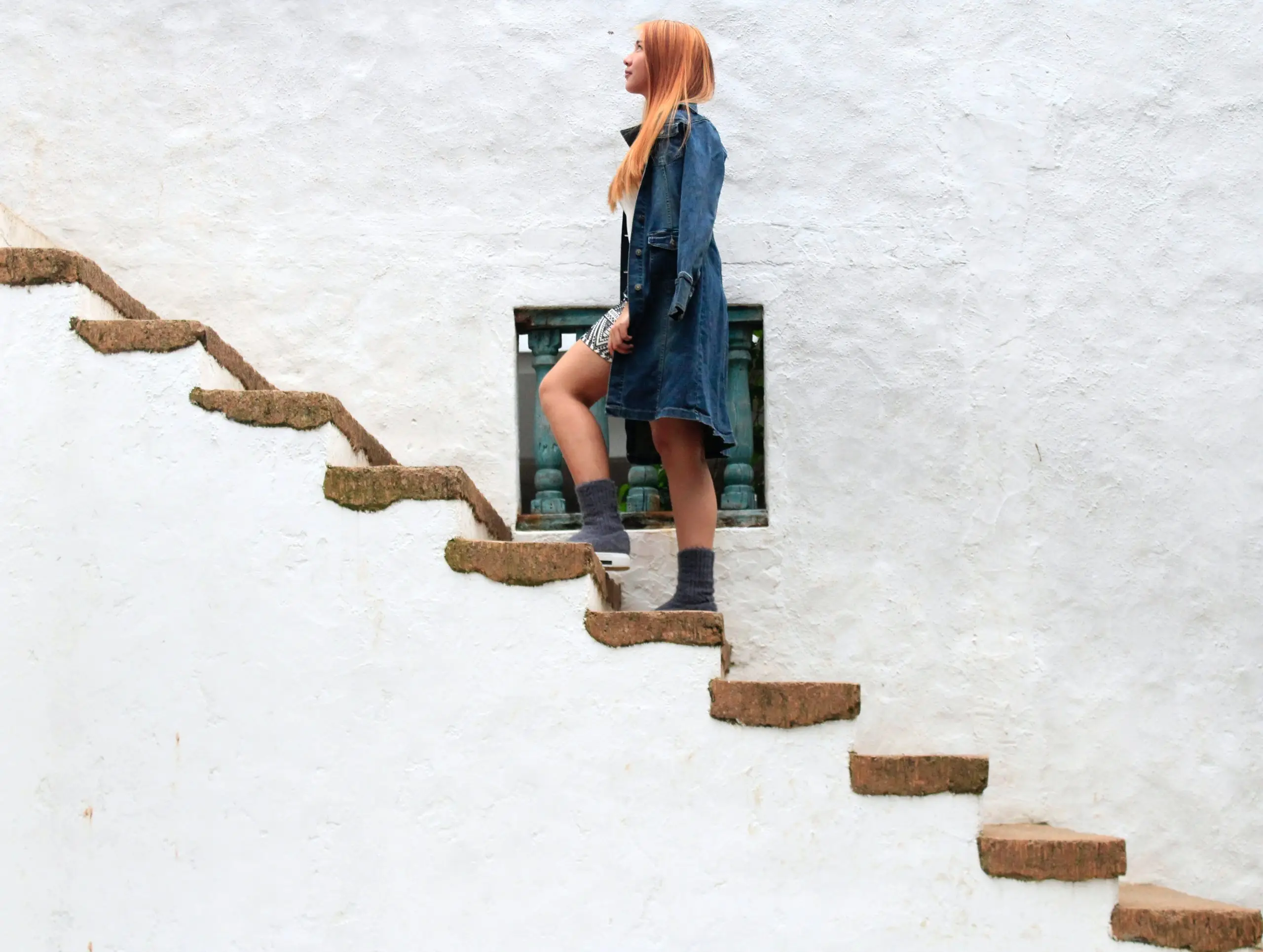 Lady walking upstairs