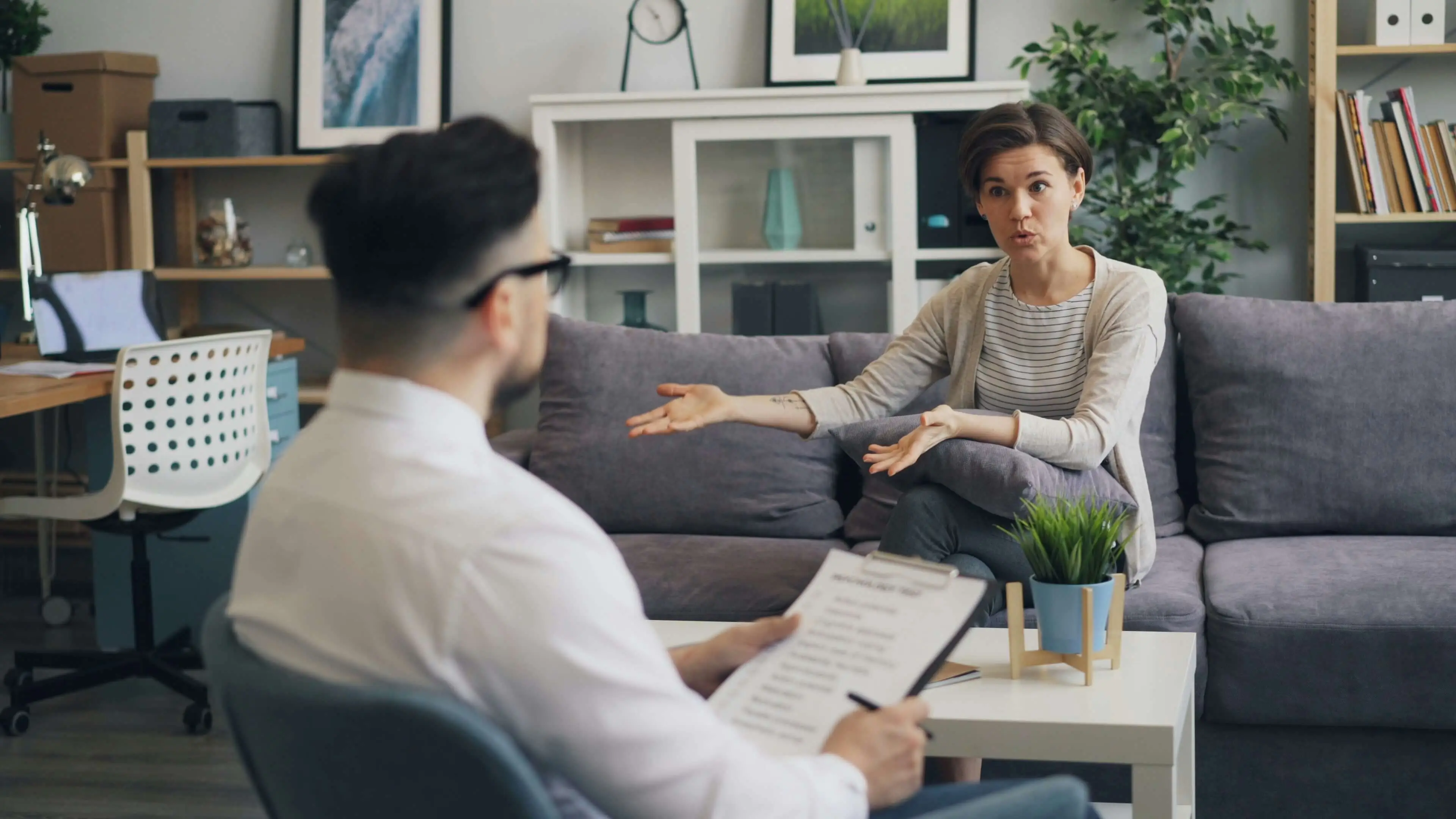 Two people in a job interview to signify how tough it is for autistic people to enter employment despite their skillset due to a lack of social skills.