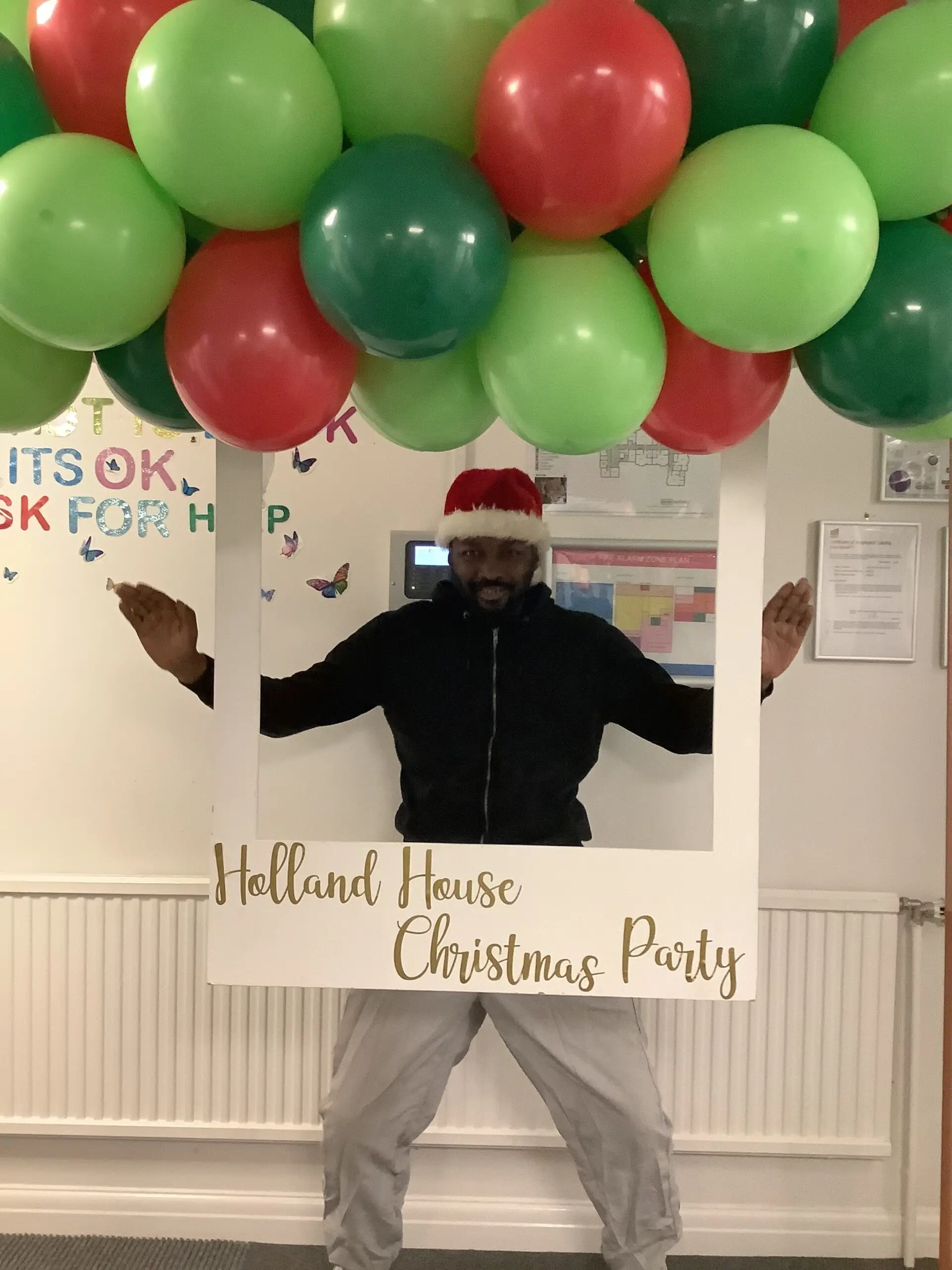 residents posing at christmas photo station